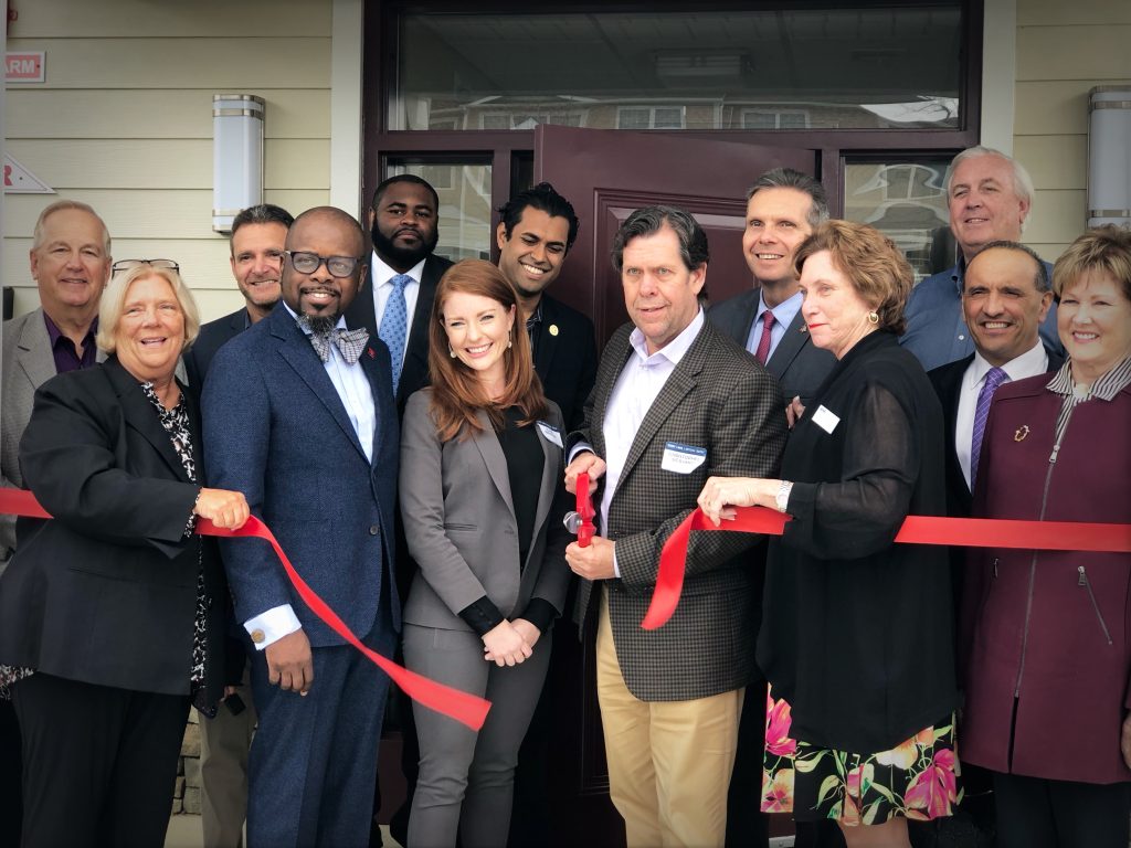 Cindy Lane Apartments Ribbon Cutting Group Photo.